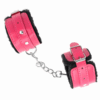 KINK - APPUI-POIGNETS DOUBLÉS DE FOURRURE PREMIUM NOIR AVEC CEINTURE ROSE FRAMBOISE AJUSTABLE 17-29 CM X 6 CM